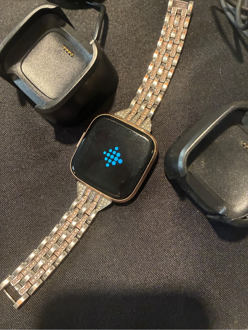 Rose Gold Fitbit Versa 2 with Rhinestone Metal Band and 2 Chargers.